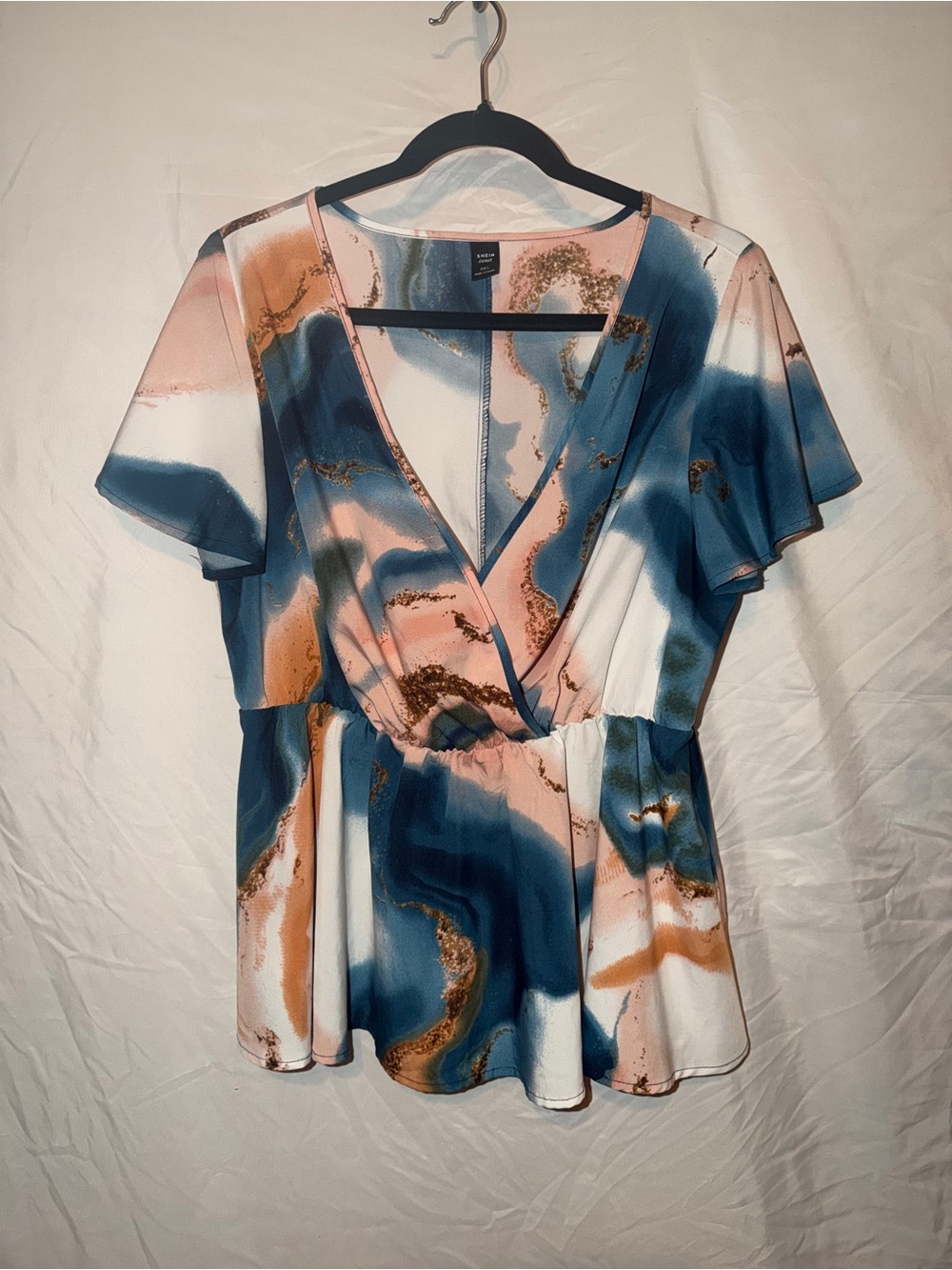 SHEIN Blue, Peach and Gold Abstract Surplice Peplum Blouse